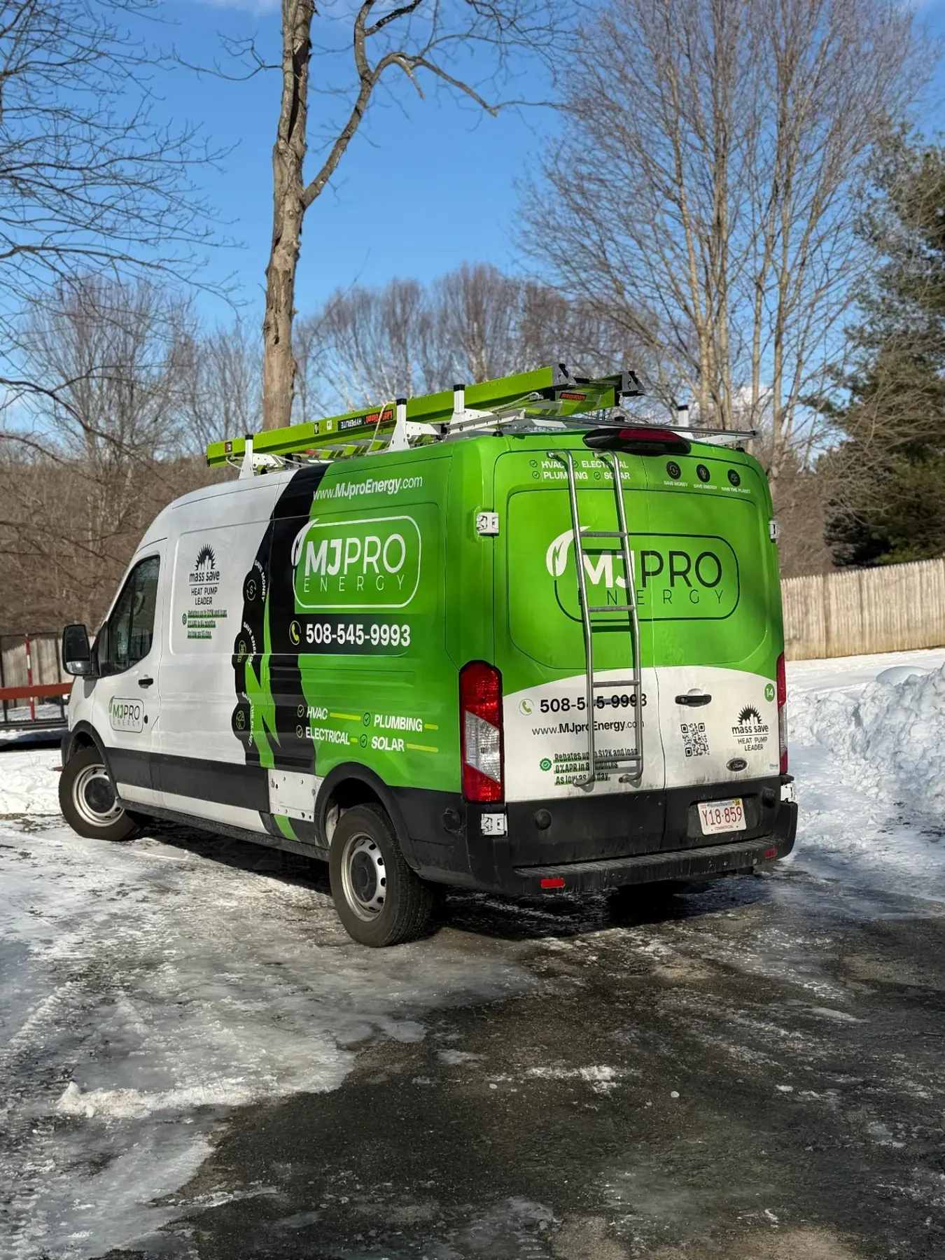 Branded MJ Pro Energy van at a Massachusetts job site