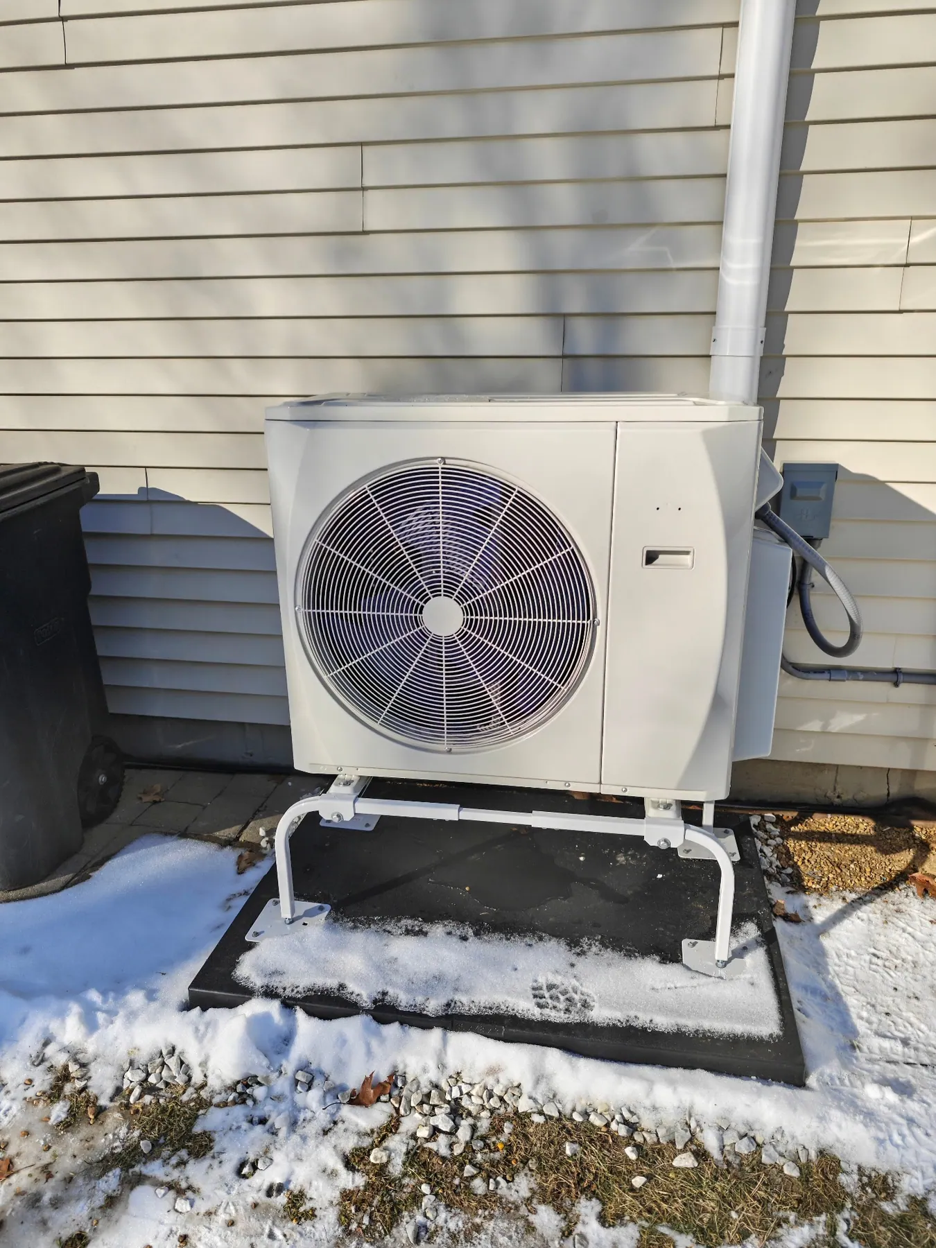 New Viessmann heat pump condenser with gauges during commissioning